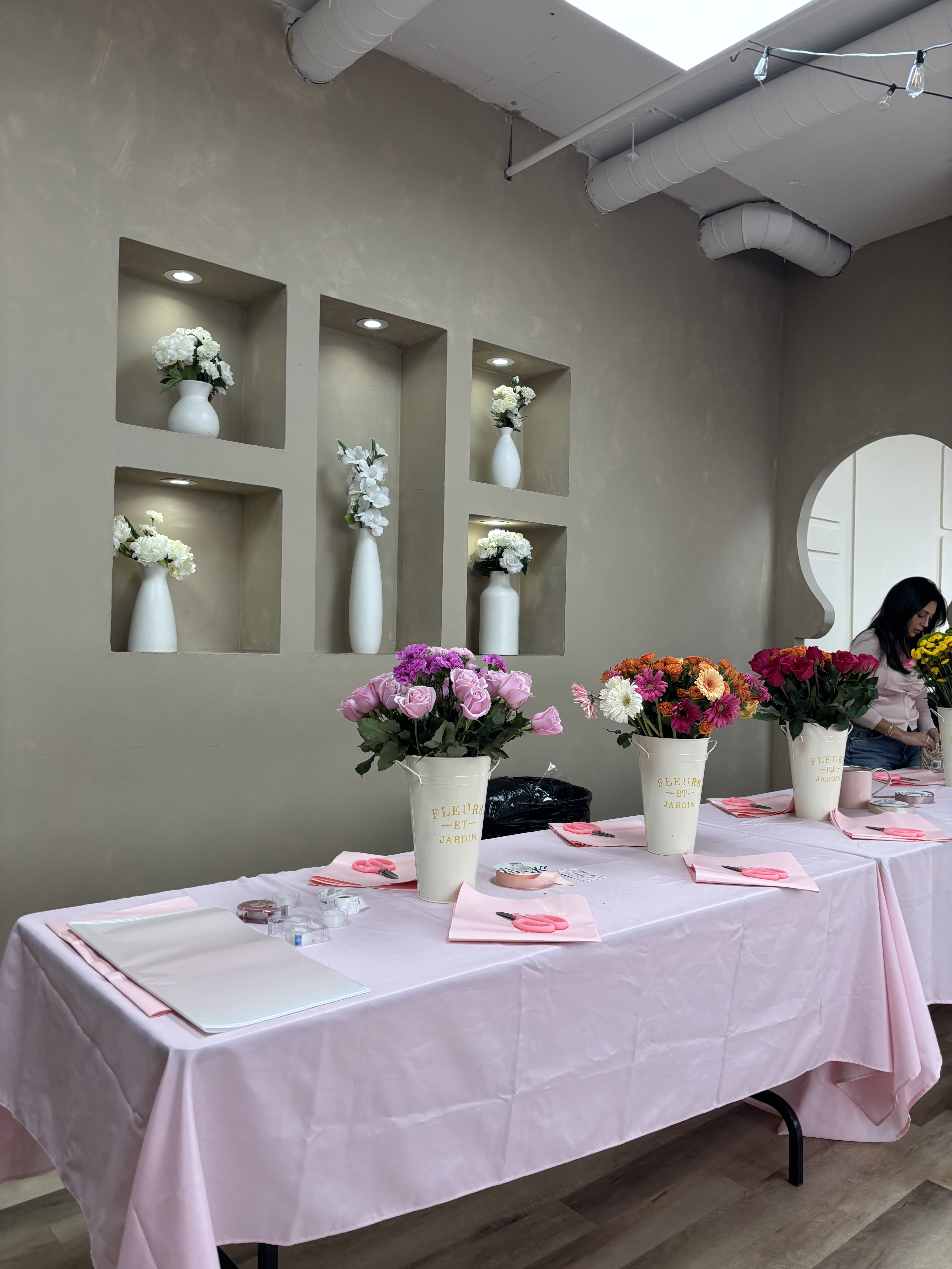 Floral workshop setup with fresh blooms