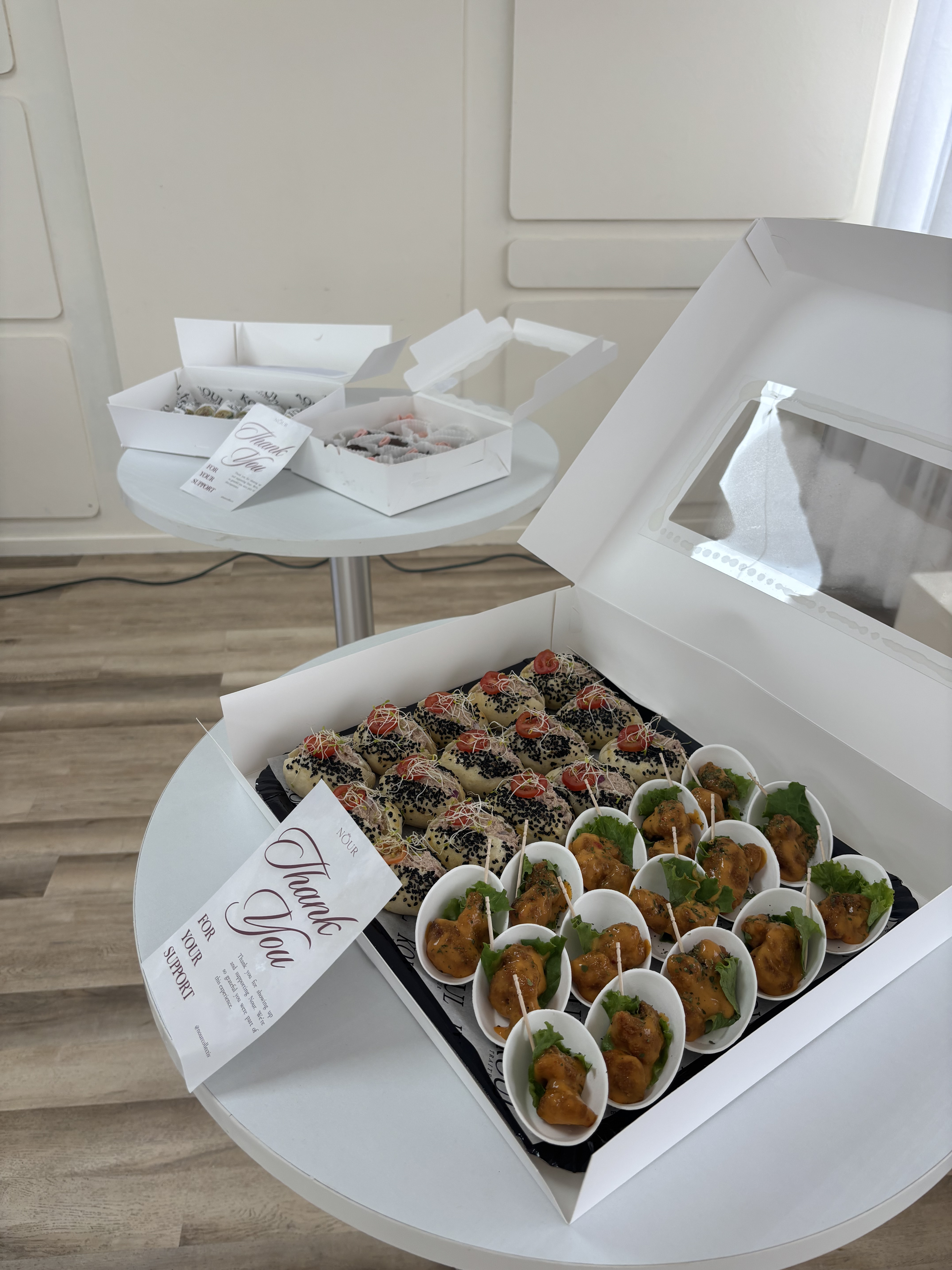 Catering spread with wraps and appetizers