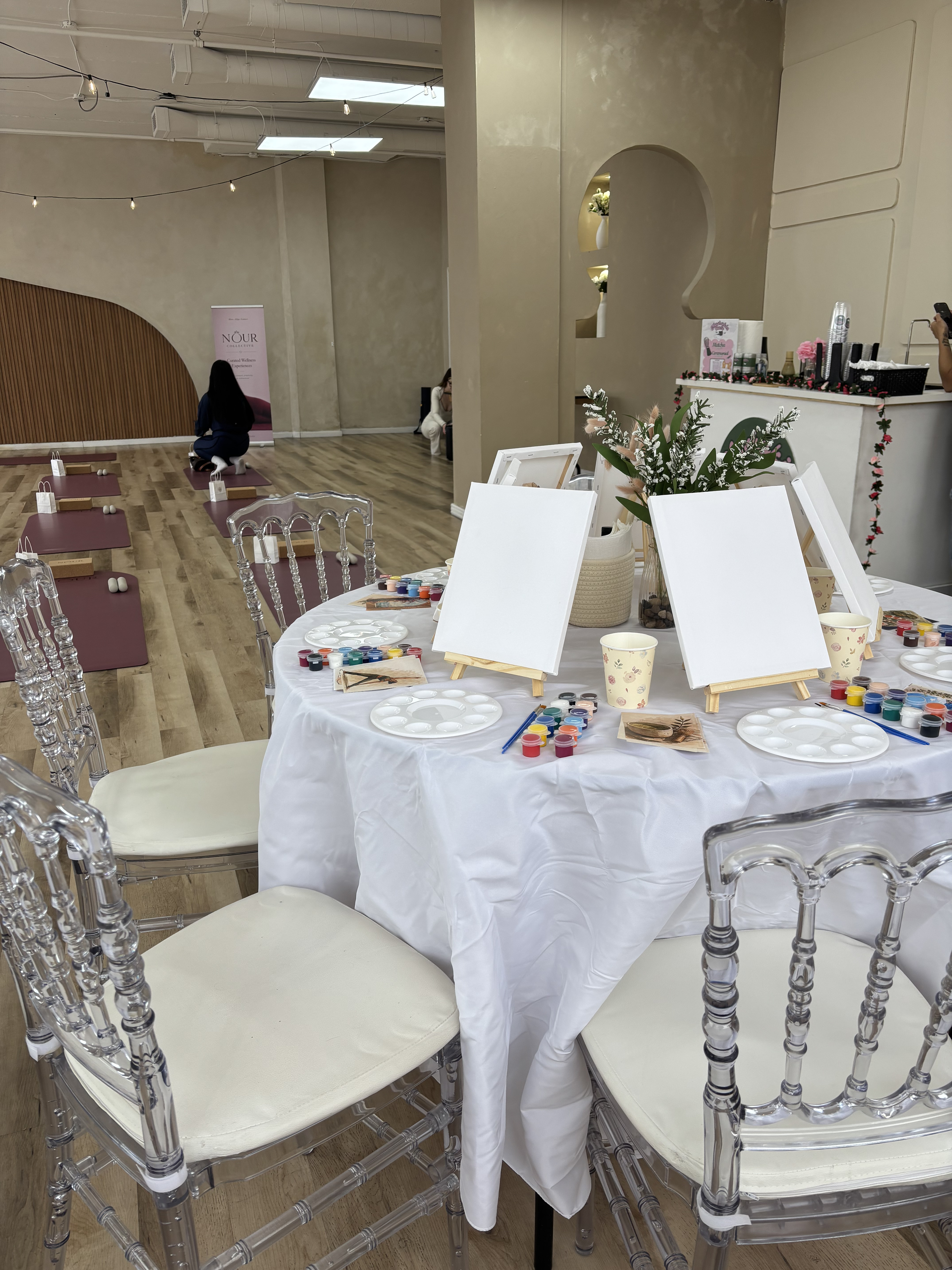 Painting workshop setup with canvases