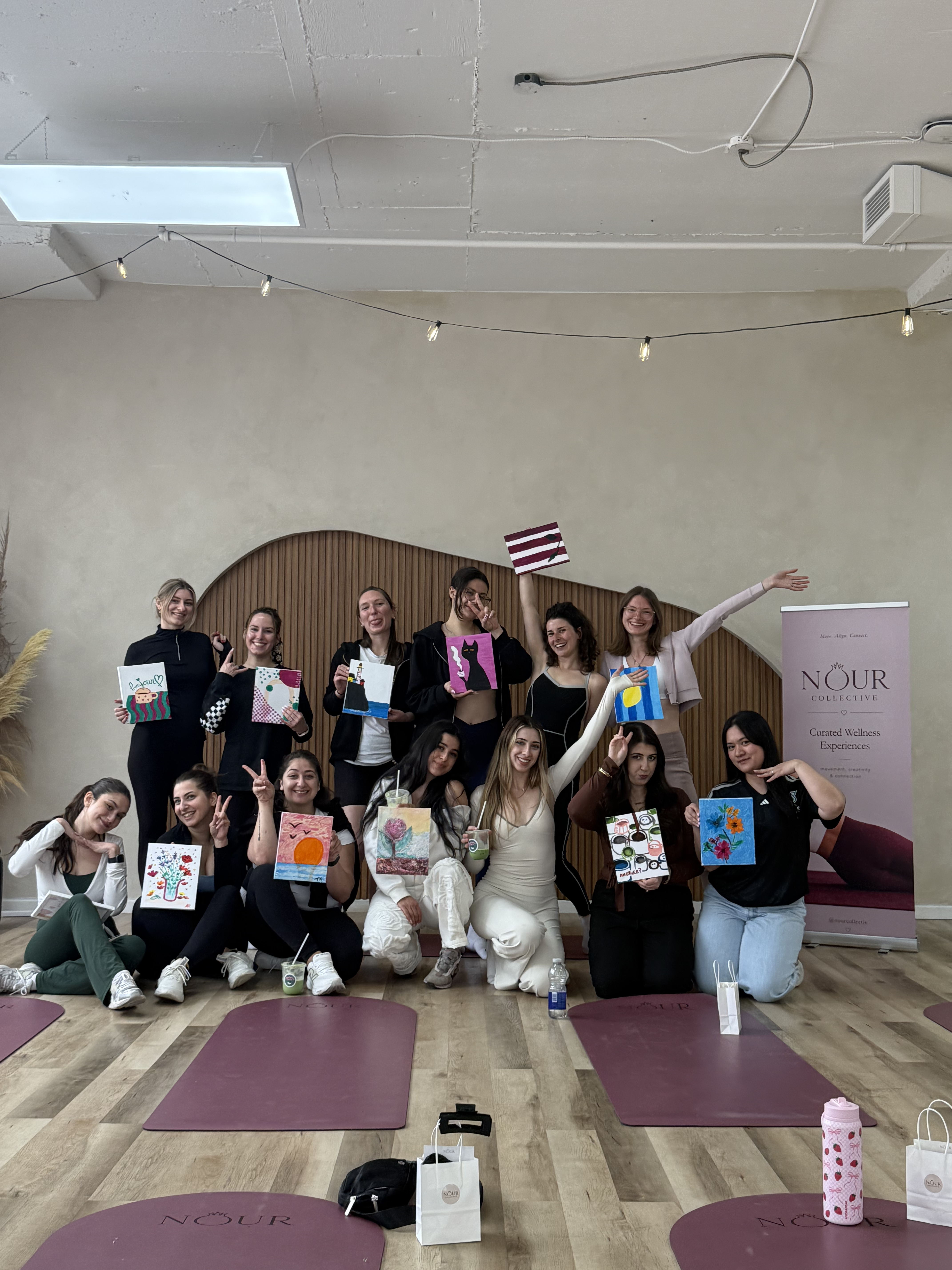 Group photo with finished paintings